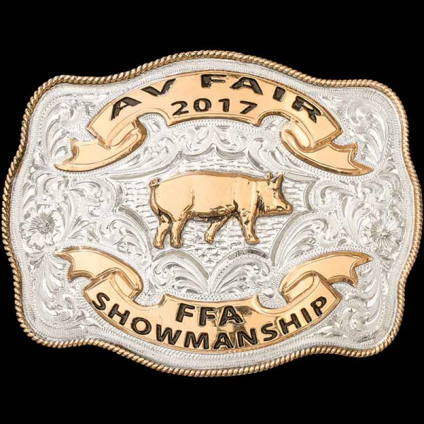"The Des Moines buckle is crafted with timeless western class, making the perfect polished trophy buckle for your event. Crafted on a uniquely shaped hand-engraved, German Silver base that is plated with Sterling Silver. Detailed with a Jewelers Bron
